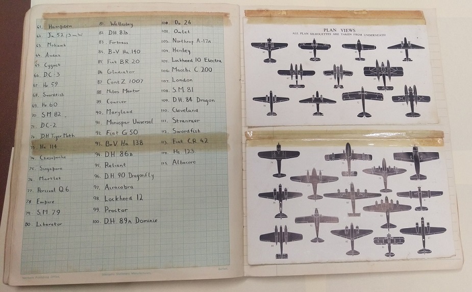 A vintage World War II notebook featuring a list of aircraft types and identification silhouettes arranged in grid format, showcasing various aircraft from different angles.