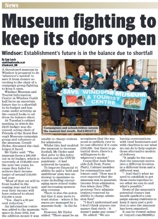 Campaigners and schoolchildren standing outside the Windsor Museum, holding a banner that reads 'SAVE WINDSOR MUSEUM & TOURIST CENTRE'.