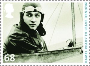 A commerative black and white stamp featuring a pilot in a vintage flight suit, preparing to fly, with the text 'HAMEL READY TO LEAVE HENDON' and the number '68' visible.