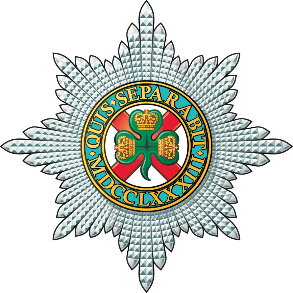 Emblem of the Irish Guards featuring a starburst design with a central crest depicting a green shamrock and crowns, surrounded by the motto 'QUIS SEPARABIT' and the year 1880.