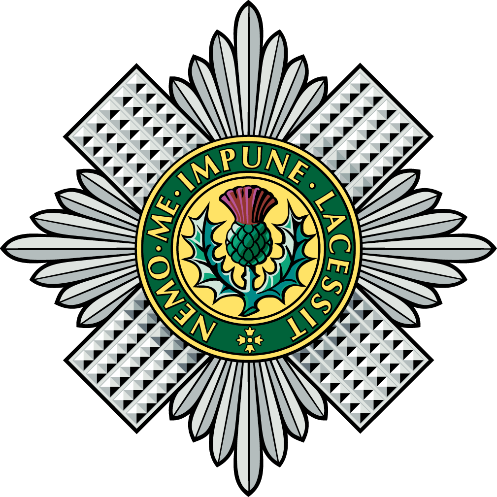 Emblem of the Scots Guards, featuring a thistle and crest surrounded by a silver insignia.